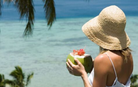 my-fiji-woman-drinking-from-coconut-beach