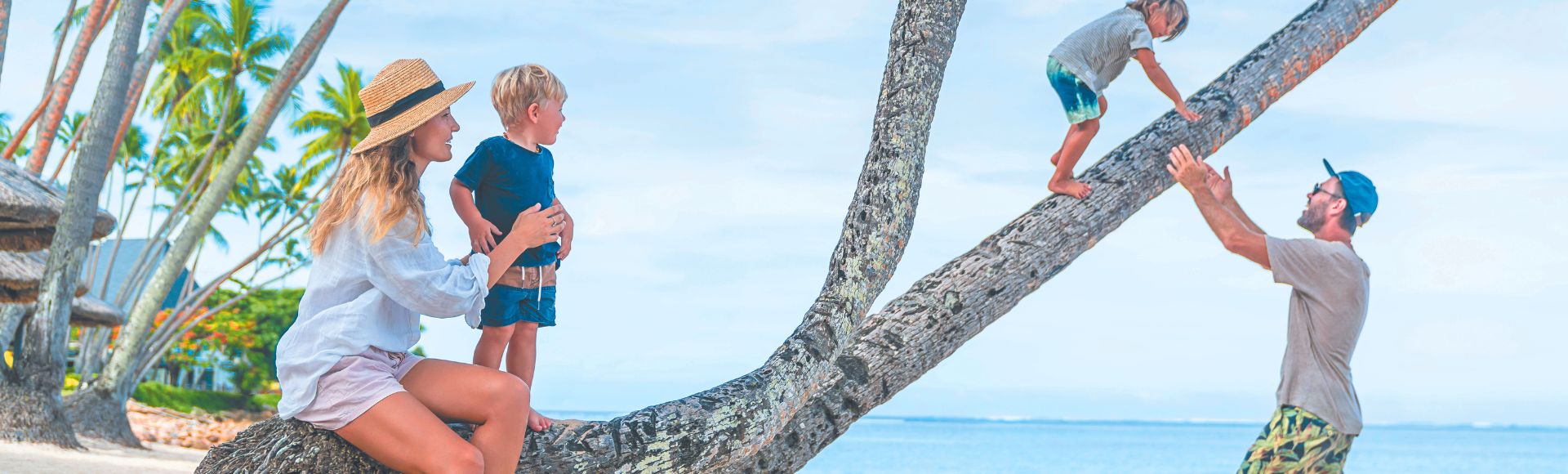 my-fiji-family-playing-on-palm-tree-at-resort-in-fiji