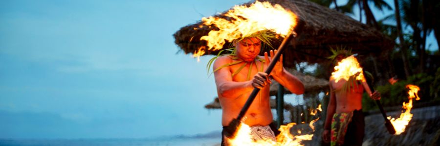 my-fiji-D4_7_Outrigger-Fiji-Beach-Resort_1407_BlueSky1-fijian-local-twirling-fire