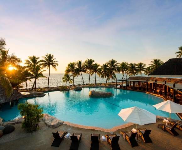 my-fiji-pool-and-dining-area-at-sunset-at-doubletree-resort-by-hilton-hotel-fiji-sonaisali-island