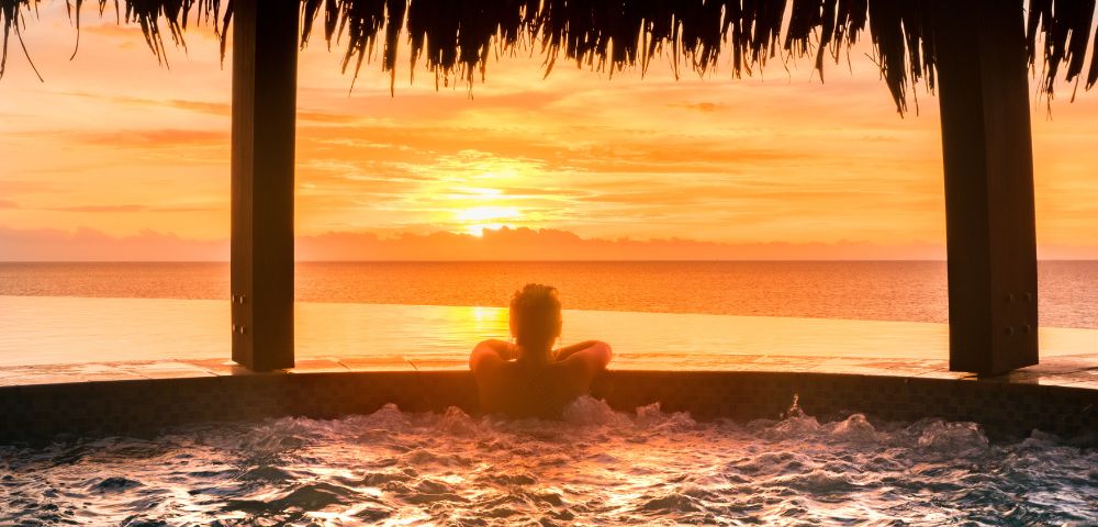 my-fiji-woman-in-spa-watching-sunset-at-Fiji-Marriott-Resort-Momi-Bay