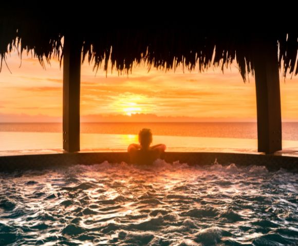 my-fiji-woman-in-spa-watching-sunset-at-Fiji-Marriott-Resort-Momi-Bay