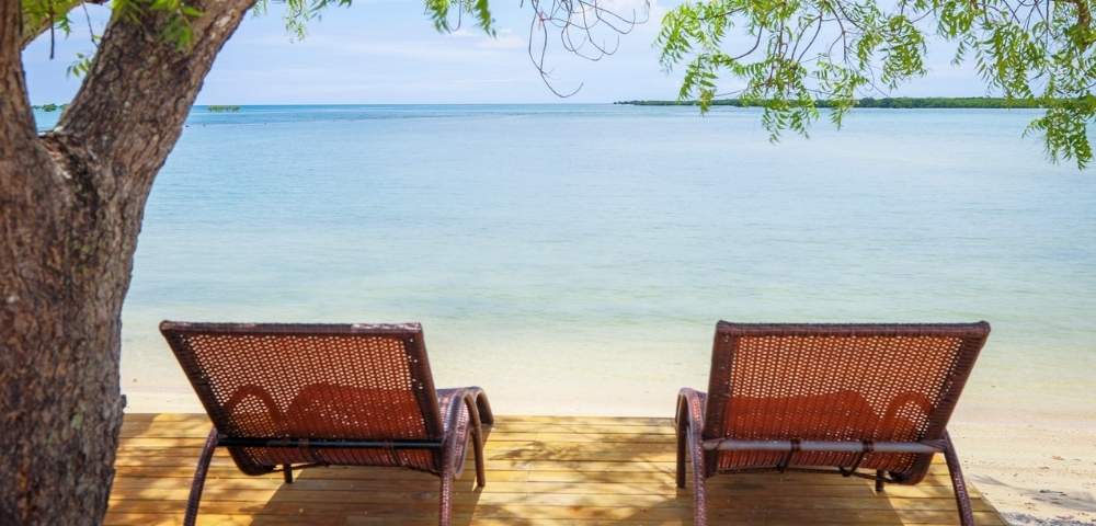 my-fiji-view-of-the-beach-with-chairs-at-landers-bay-resort-spa-fiji