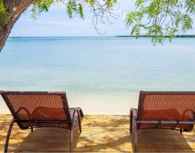 my-fiji-view-of-the-beach-with-chairs-at-landers-bay-resort-spa-fiji