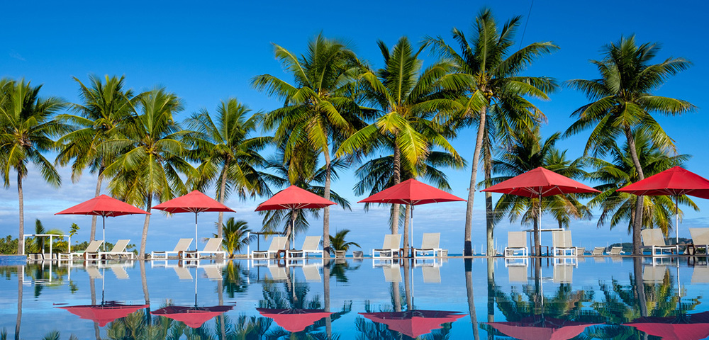 my-fiji-pool-lined-with-umbrellas-at-musket-cove-island-resort-and-marina