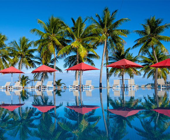 my-fiji-pool-lined-with-umbrellas-at-musket-cove-island-resort-and-marina