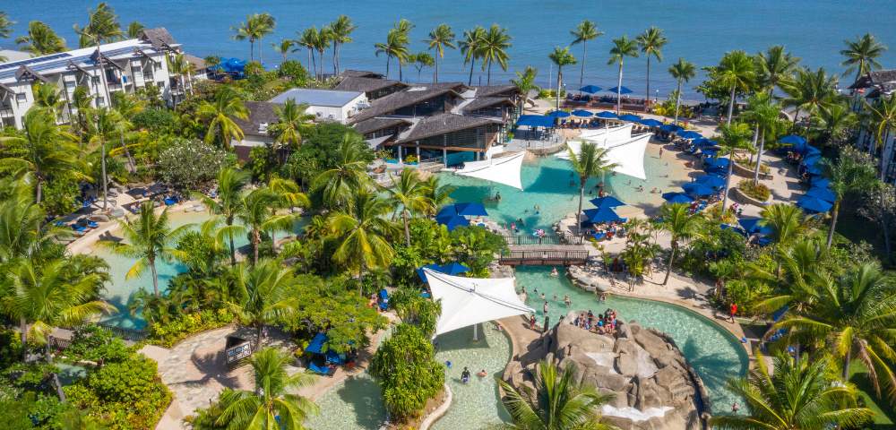 MYHOLIDAY-RADISSON-BLU-RESORT-FIJI-DENARU-ISLANDAERIEL-VIEW-OF-RESORT-WITH-NATURAL-SWIMMING-POOLS