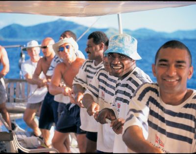 MYFIJI-Robinson-Crusoe-Island-Tours-Tivua-Island-People-sailing-and-smilling