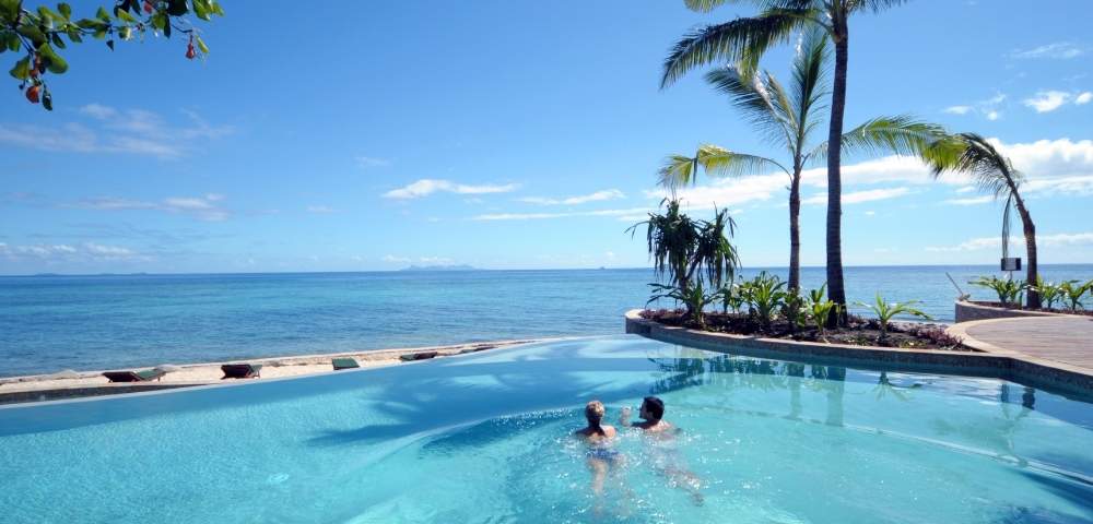 my-fiji-two-people-swimming-in-the-pool-at-treasure-island-resort