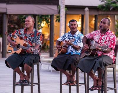 my-fiji-three-locals-singing-and-playing-guitar-at-vomo-island-fiji