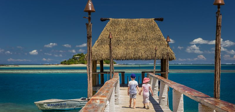 my-fiji-two-kids-walking-down-the-jetty-at-at-malolo-island-resort