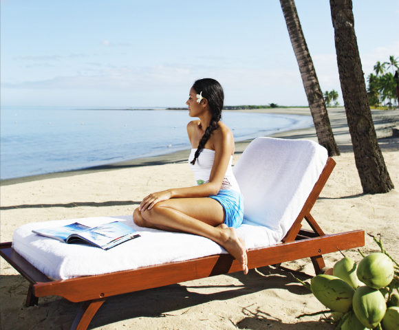 my-fiji-woman-relaxing-on-a-day-bed-at-the-beach-at-sheraton-fiji-golf-beach-resort