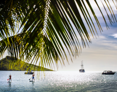 my-fiji-two-poeple-stand-up-paddleboarding-at-volivoli-beach-club