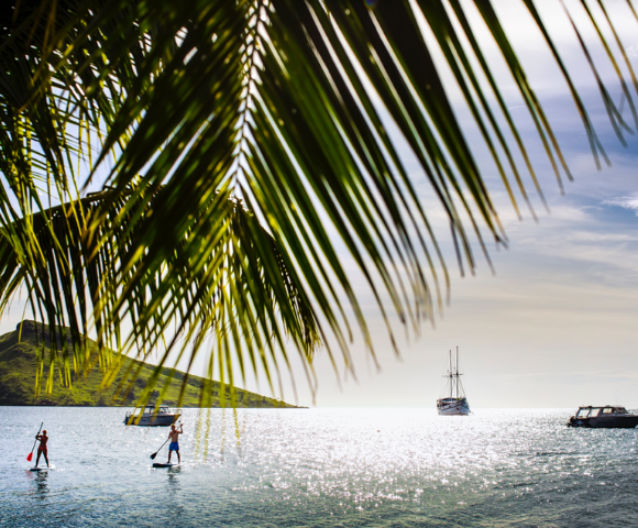 my-fiji-two-poeple-stand-up-paddleboarding-at-volivoli-beach-club